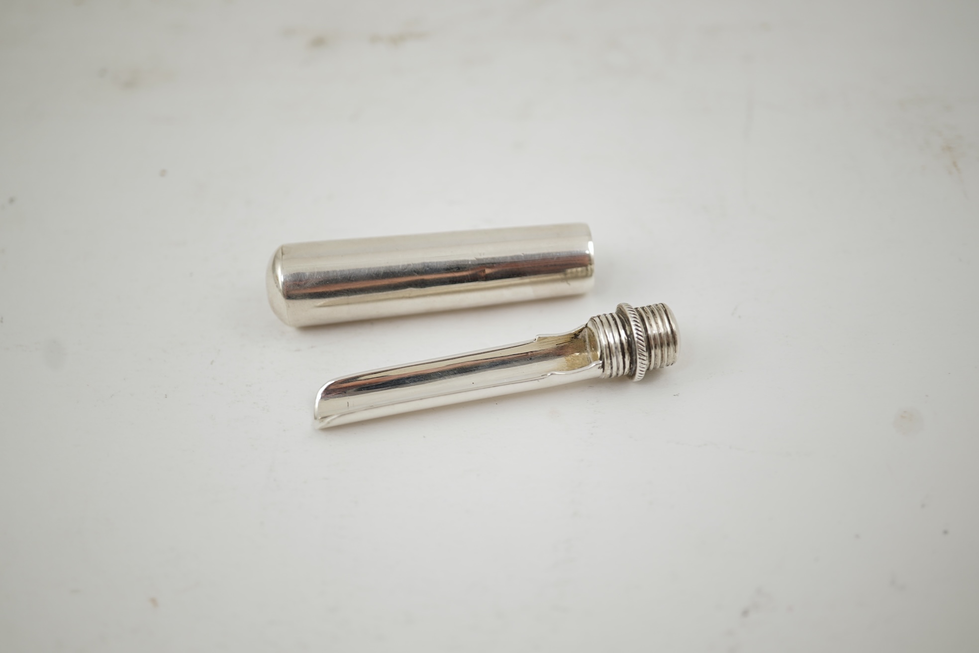 An early Victorian silver travelling apple corer, by Joseph Wilmore